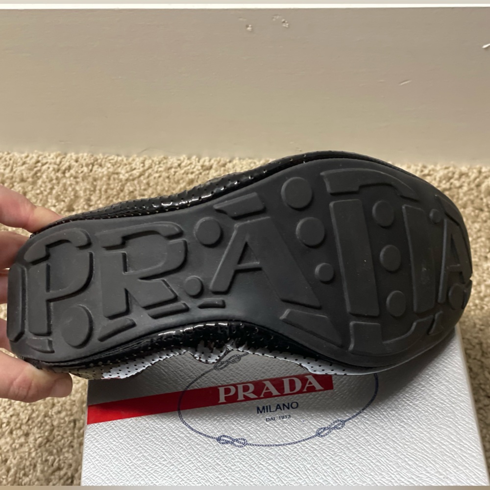 LIKE NEW Prada flats with original box, dust bag, and identification card